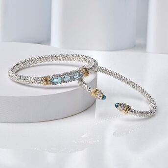 Blue topaz and diamonds, crafted to capture lifes meaningful moments in every sparkling detail. 

V